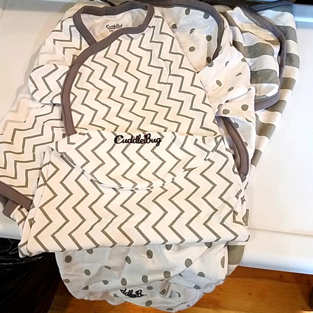 3 CuddleBug swaddles
